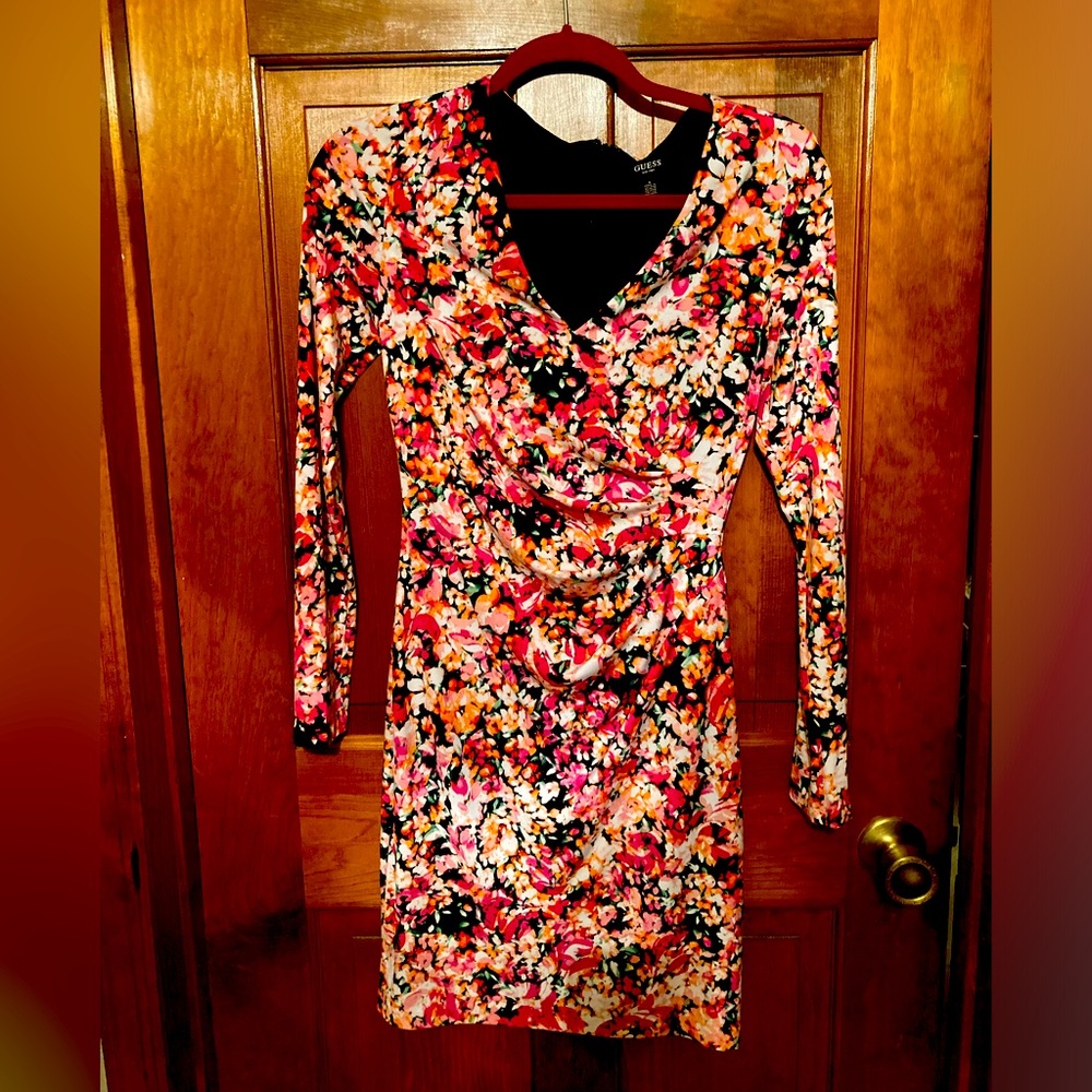 Guess women’s dress, soft sexy know, figure hugging.